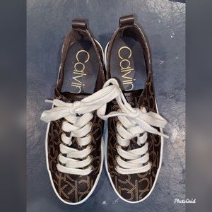 Calvin Klein size 6 brown and gold sneakers